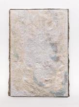 An abstract work made in pale linen and bronze.