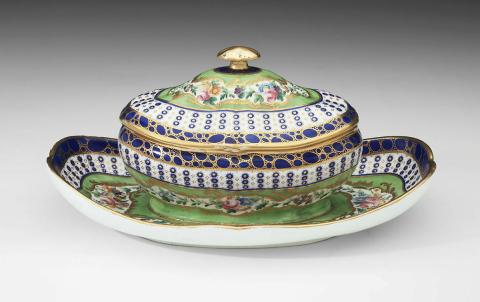 Artwork Sauce tureen and fixed stand this artwork made of Soft-paste porcelain oval shaped turneen and cover on fixed stand painted between bands of coloured flowers between gilt foliage reserved on an apple green ground within bands of gilt oeil-de-perdrix and cailloute, created in 1770-01-01