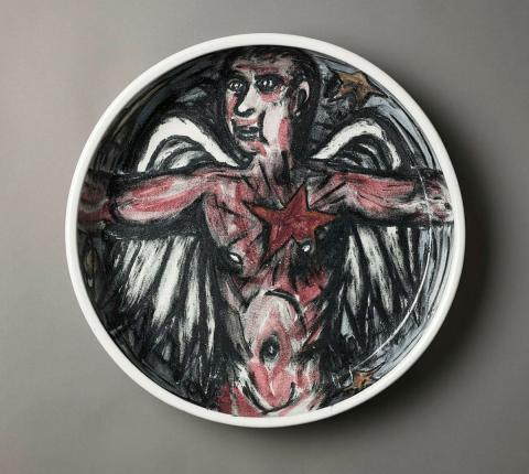 Artwork Shallow bowl:  Spirit well this artwork made of Stoneware, wheelthrown buff clay with crimson, black, ochre and blue underglaze colours, created in 1990-01-01