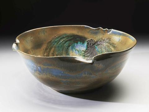 Artwork Bowl this artwork made of Stoneware, wheelthrown buff clay with altered rim and incised decoration.  Blue shaded to olive green glaze, created in 1977-01-01