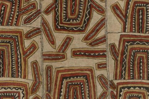 A detail view of a work painted on bark