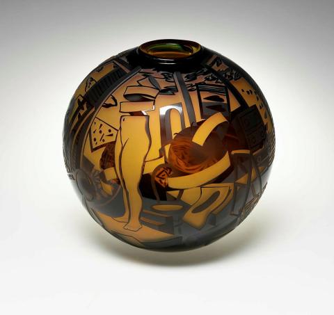 Artwork Sphere:  Tuz this artwork made of Hot-worked glass sphere, cased black over amber and sandblasted, created in 1989-01-01