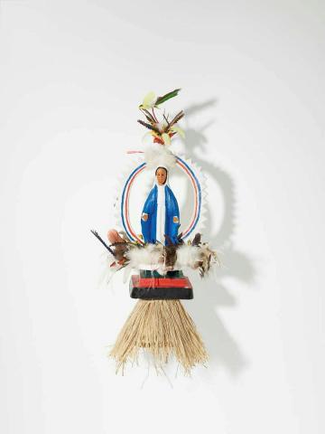 Artwork Mary this artwork made of Tokatokoi, headdress: wood, feathers, plastic Virgin Mary figurine, synthetic polymer paint, grass fibre, created in 2011-01-01