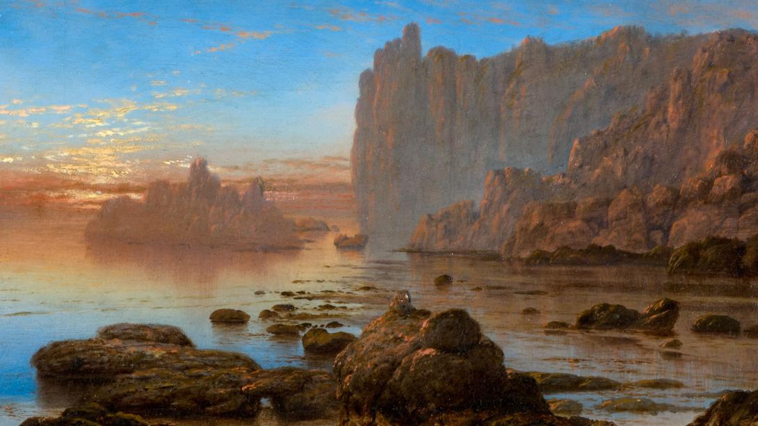 A detail view of a coastal oil painting by Isaac Walter Jenner, with a blue sky blurring into an orange sunset, and red-brown cliffs.