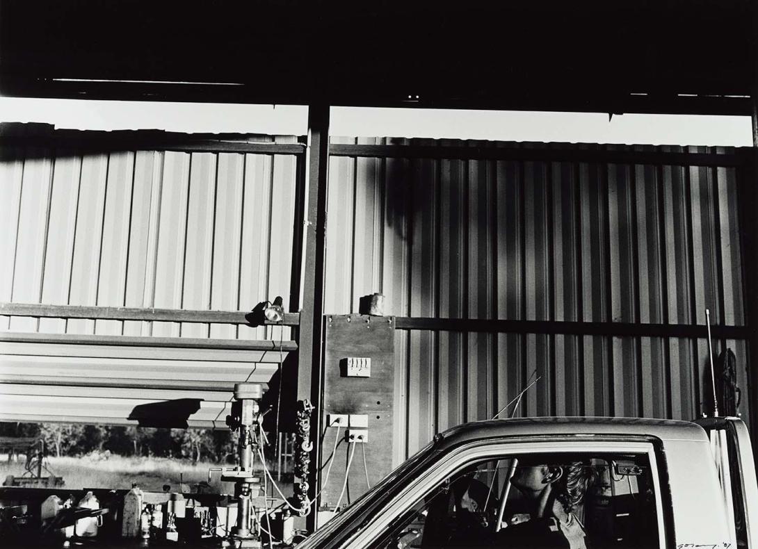 Artwork 25 March 1987, Yandarlo Station, near Tambo - Michael fitted a radar detector to his ute in the machinery shed (from 'Journeys north' portfolio) this artwork made of Gelatin silver photograph on paper, created in 1987-01-01