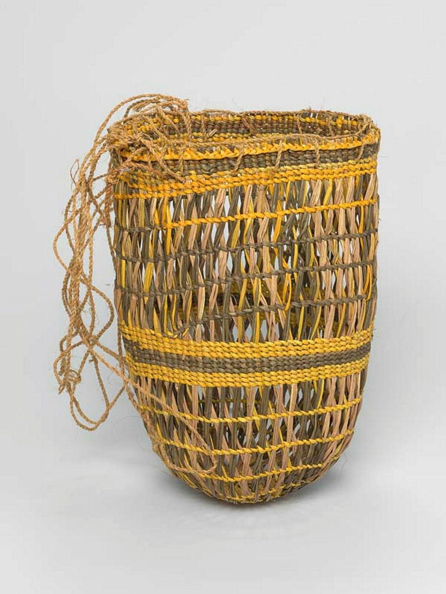 Artwork Basket this artwork made of Woven pandanus, dyes, created in 1999-01-01