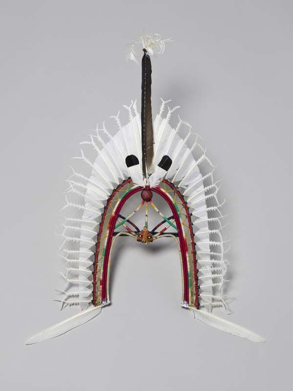 Artwork Dari headdress this artwork made of Cane, cotton thread, wood, paint, PVA fixative and sea-bird feathers, created in 2000-01-01