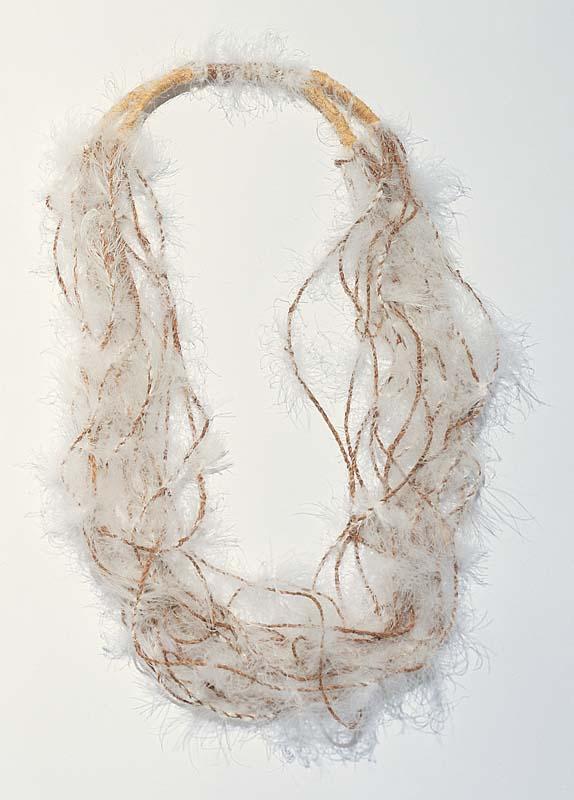 Artwork String chest harness this artwork made of Goose feathers, kapok and banyan string, created in 2003-01-01