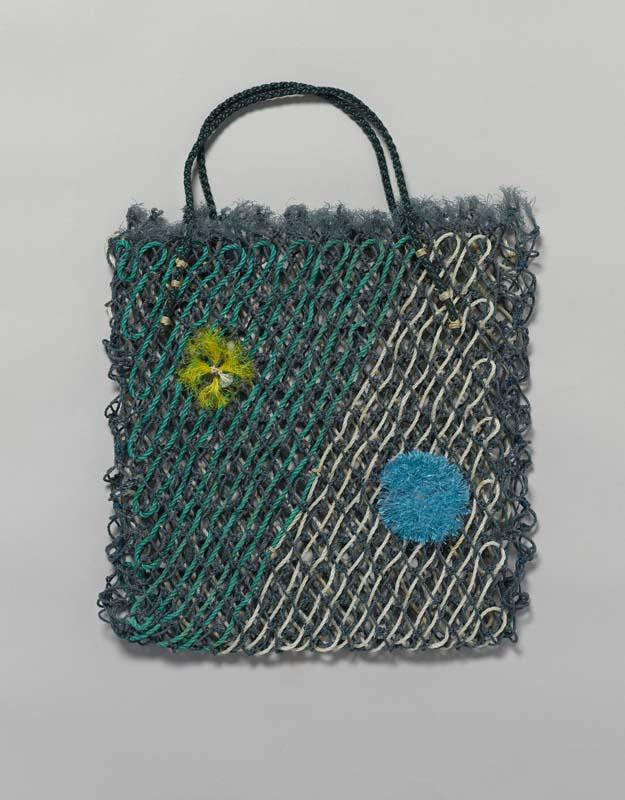 Artwork Ghost net gear bag (yellow and blue flower) this artwork made of Woven reclaimed acrylic fishing net, created in 2009-01-01