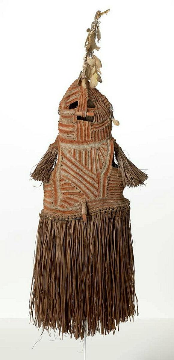 Artwork Jinir (spirit mask) this artwork made of Rattan, sago palm fronds, fum (mulberry bark), white cockatoo feathers (discoloured), natural ochres, lime and a stick, created in 2012-01-01