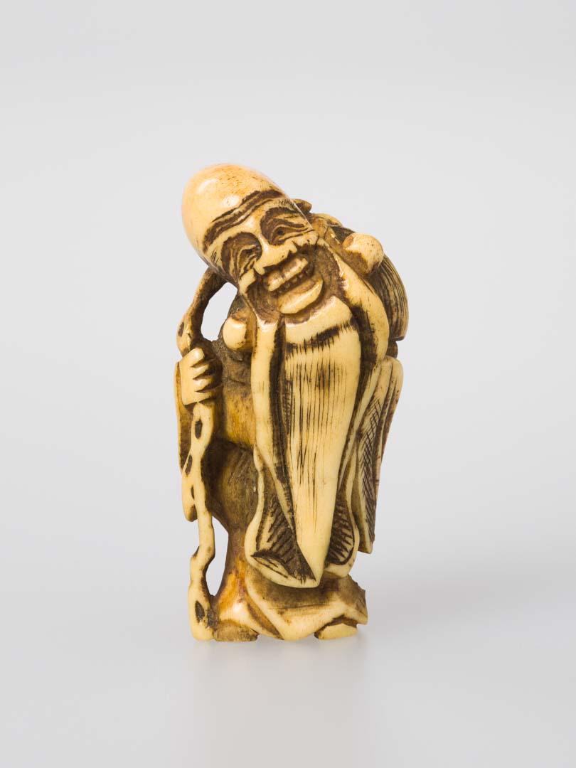 Artwork Netsuke: (Fukurokuju) this artwork made of Carved ivory, created in 1800-01-01