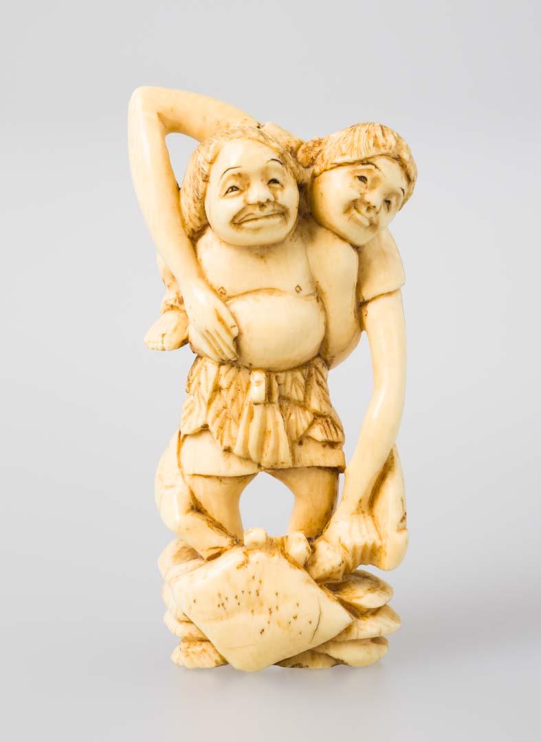 Artwork Netsuke: (Ashinaga and Tenaga) this artwork made of Carved ivory, created in 1800-01-01