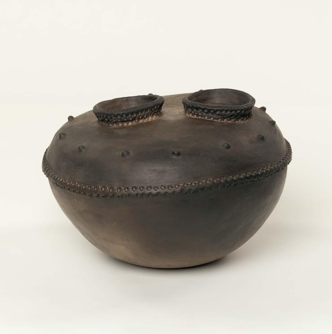 Artwork Two-mouthed water storage pot (Yayob Village, Madang) this artwork made of Hand-thrown earthenware with applied decoration and beeswax, created in 2016-01-01