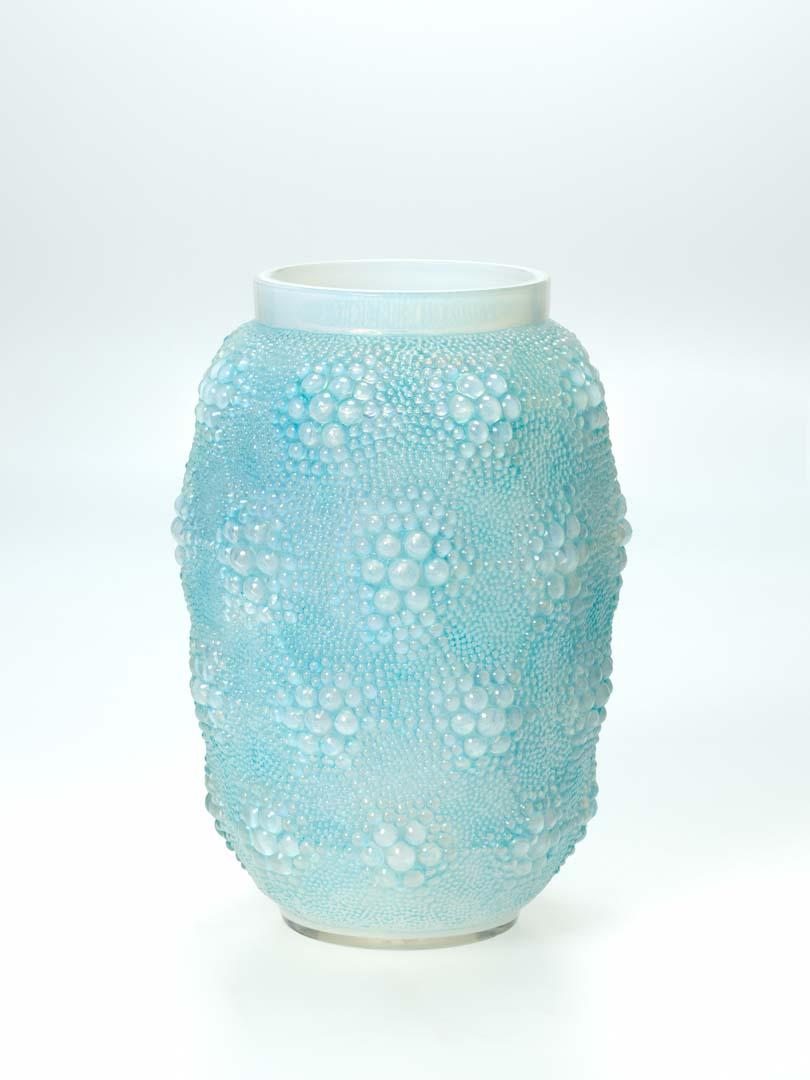 Artwork Davos vase this artwork made of Mould blown opalescent glass with blue patina, created in 1932-01-01