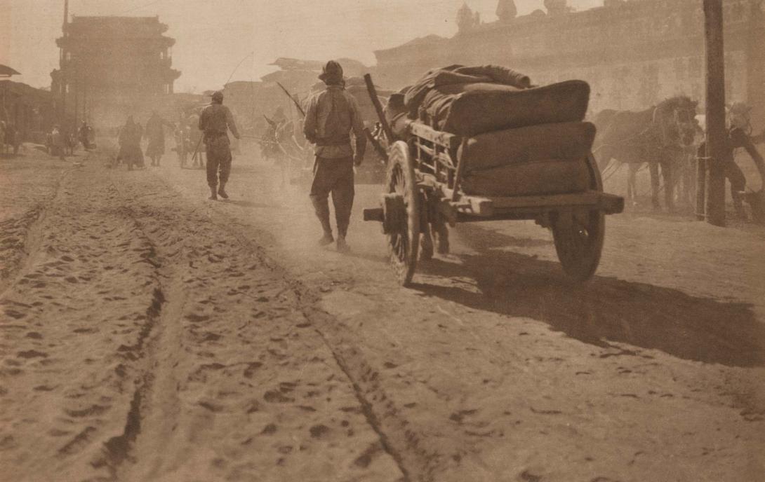 Artwork Along the sunlit dusty street (near the Yung Ting Men) Peking (plate XV from ‘The Pageant of Peking’ book) this artwork made of Photogravure tipped on paper page, created in 1915-01-01