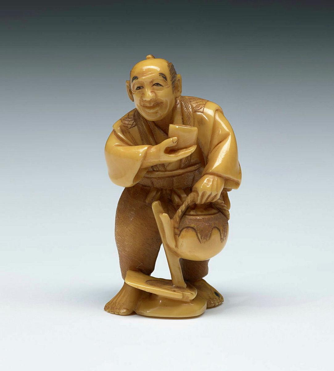 Artwork Netsuke (vendor serving tea) this artwork made of Ivory, carved and incised, created in 1800-01-01