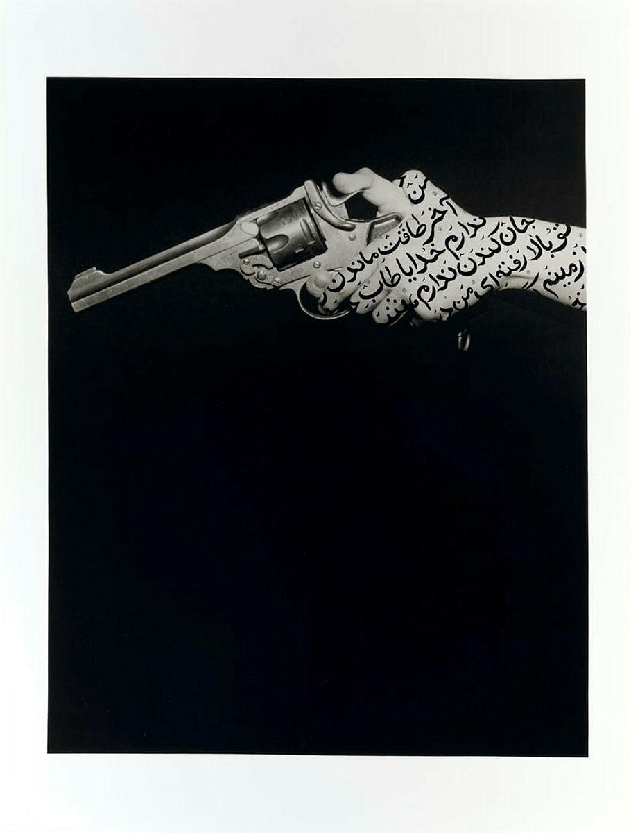 Artwork Grace under duty (from the 'Women of Allah' series) this artwork made of Gelatin silver photograph with calligraphy on paper, created in 1994-01-01