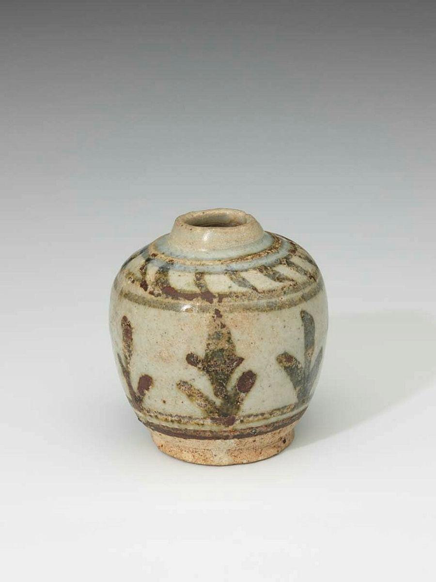 Artwork Jarlet with brushed lines and vegetal scrolls this artwork made of Stoneware with slip and underglaze brownish/black decoration, created in 1200-01-01