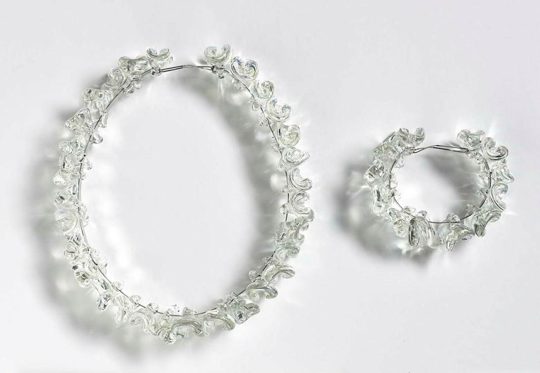 Artwork Neckpiece and bracelet this artwork made of Lamp worked pyrex glass petal shapes, iridised and with metal supports, created in 1988-01-01