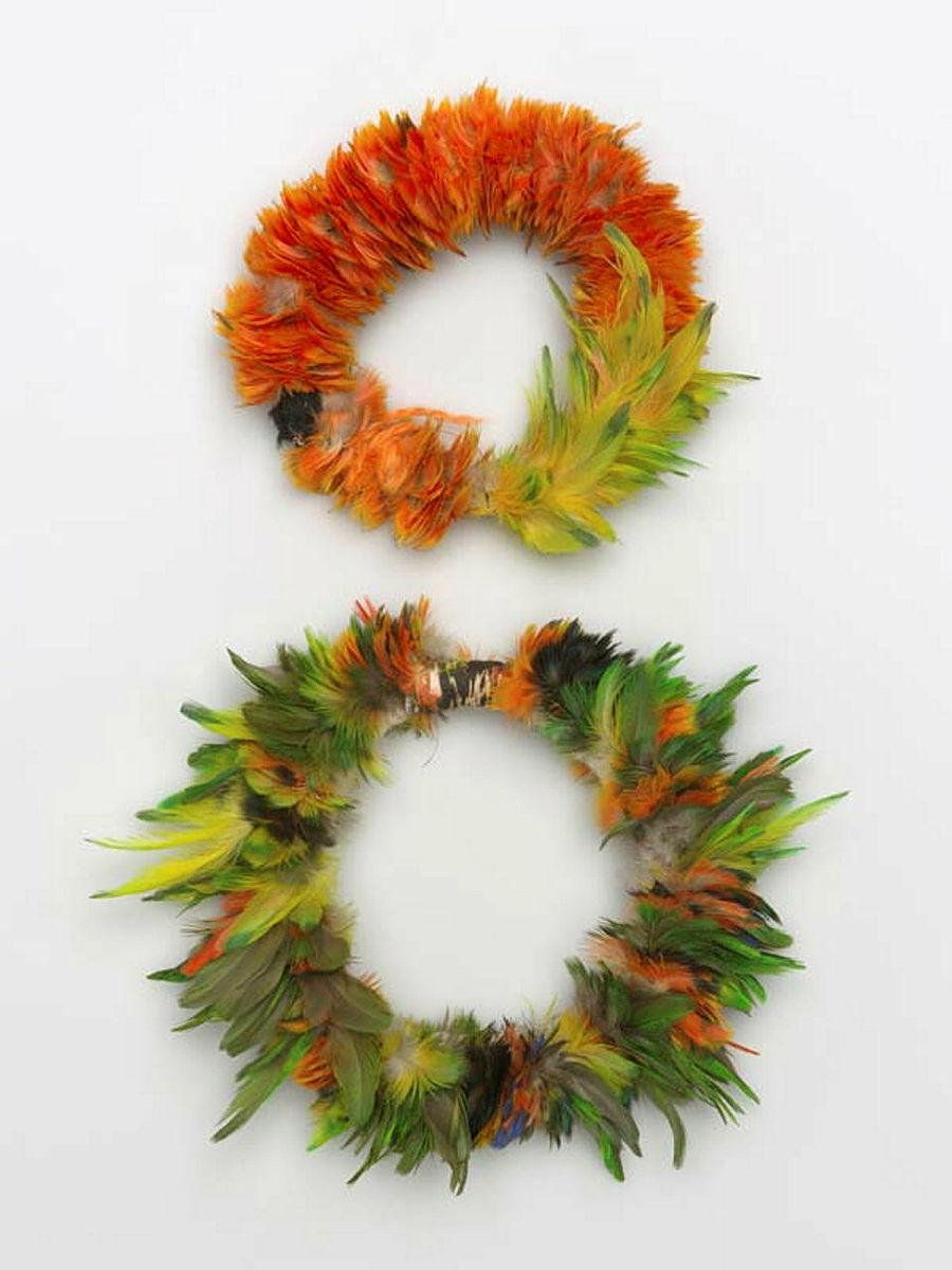 Artwork Ceremonial armbands this artwork made of Bark fibre string with red-winged parrot and red-collared lorikeet feathers, created in 1997-01-01