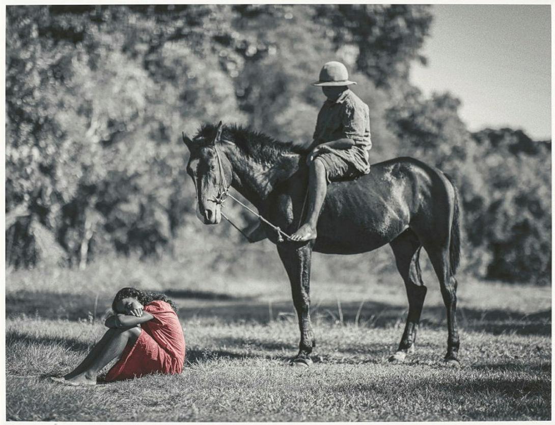 Artwork Bleeding from welts across her body she remembered being picked up by someone on horseback, travelling to a place where ‘there were a lot of coloured people’ and onto Ingham Police Station. ‘I was only small and the lady of the house – I think that was h this artwork made of Photograph on cotton rag, created in 2023-01-01