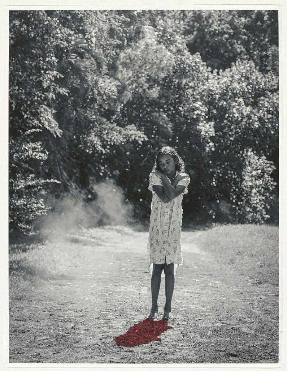 Artwork Bleeding from welts across her body she remembered being picked up by someone on horseback, travelling to a place where ‘there were a lot of coloured people’ and onto Ingham Police Station. ‘I was only small and the lady of the house – I think that was h this artwork made of Photograph on cotton rag, created in 2023-01-01