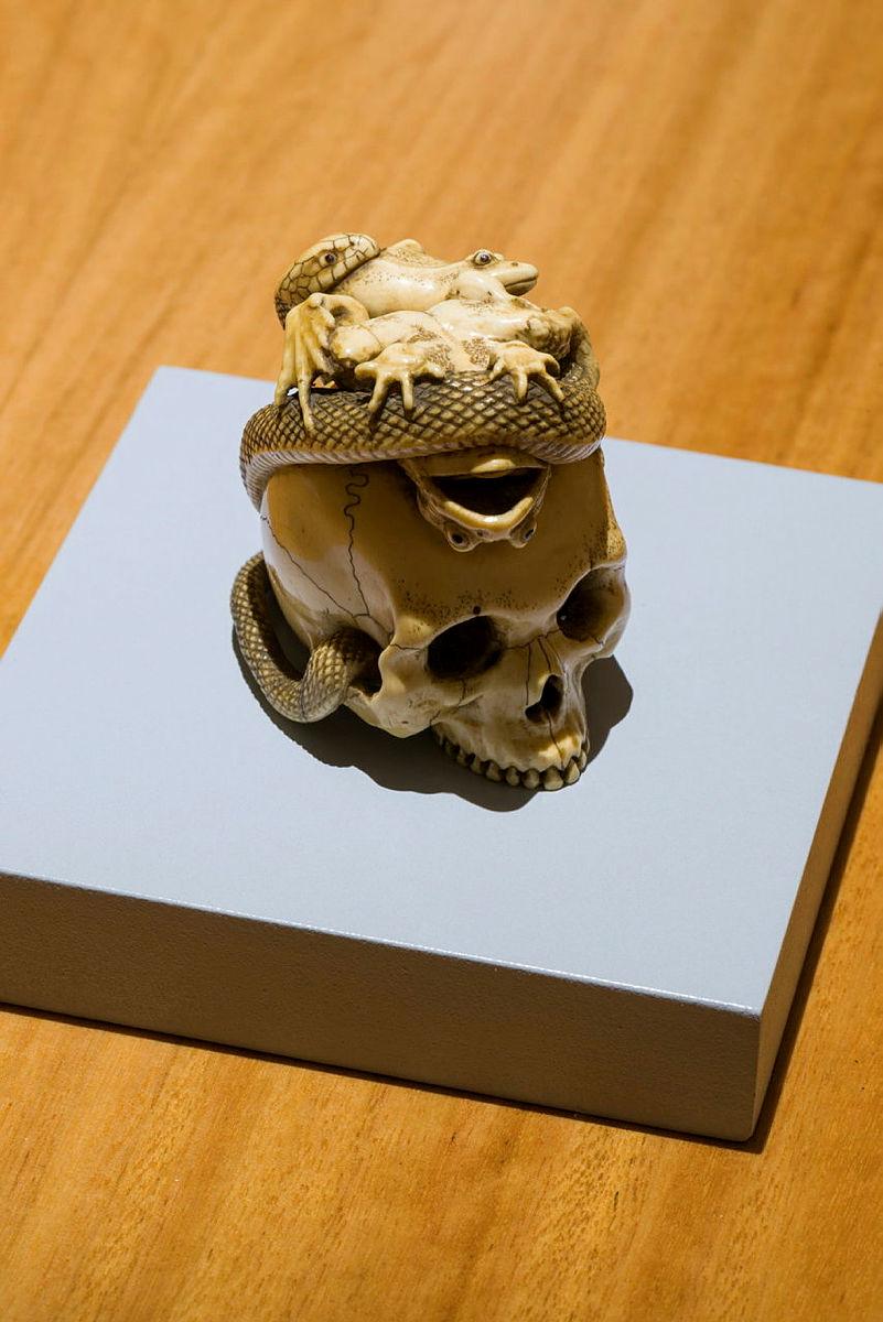 Artwork Okimono: (skull with snake and frogs) this artwork made of Carved ivory, created in 1800-01-01