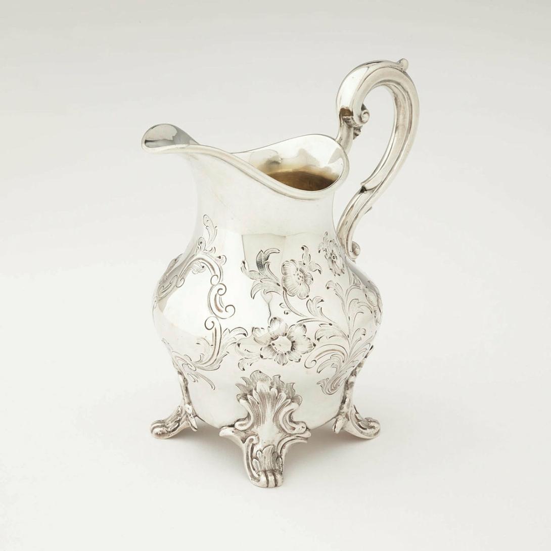 Artwork Cream jug this artwork made of Silver in the rococo revival manner with flowers and scrolls in relief, created in 1844-01-01