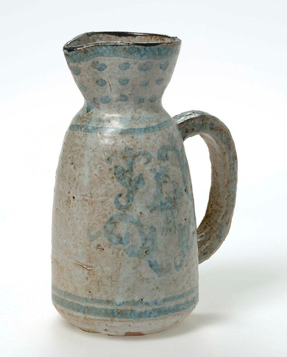 Artwork Jug this artwork made of Tin glazed earthenware with blue brushed decoration of cocks, created in 1955-01-01