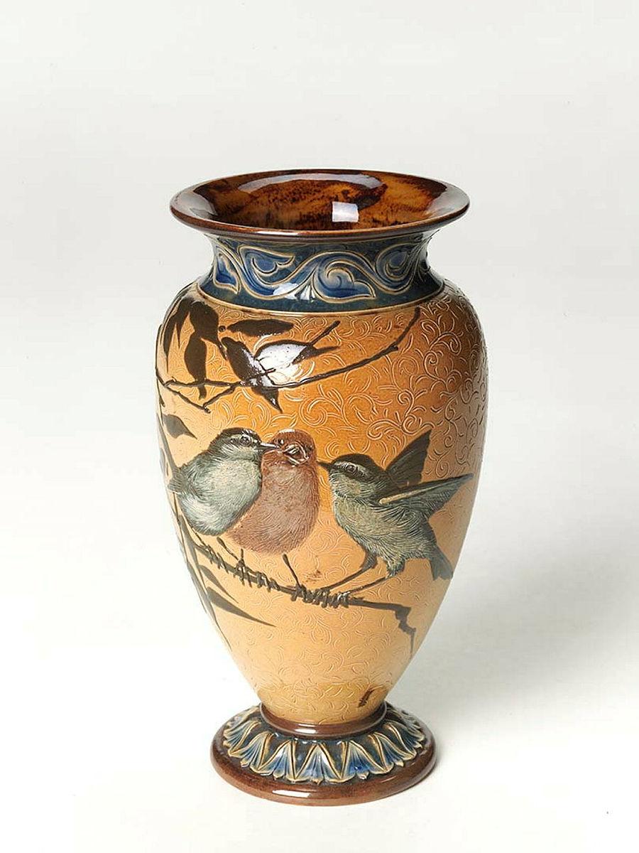 Artwork Vase this artwork made of Stoneware, decorated in pâte sur pâte technique with a bird and branches over an incised salt glazed ground, created in 1882-01-01