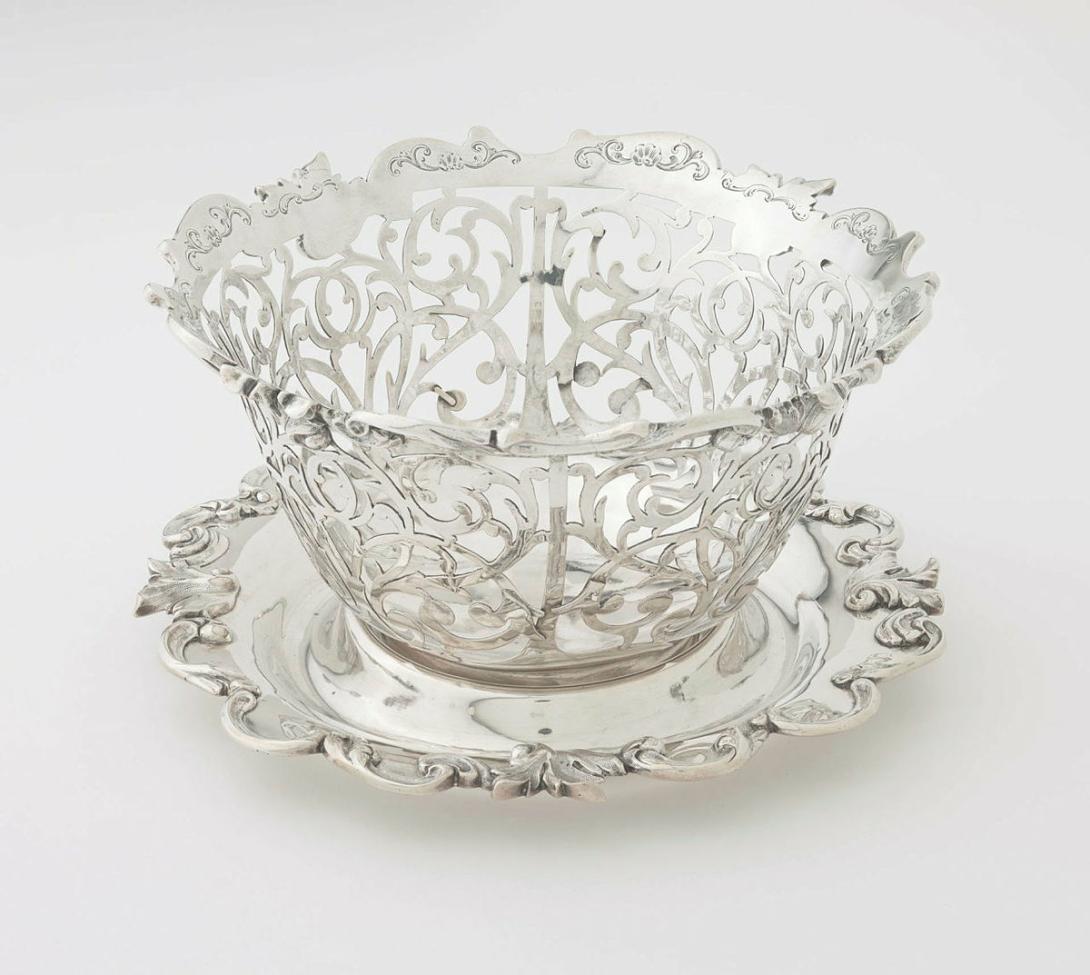 Artwork Basket and stand this artwork made of Silver, the bowl pierced with scroll motifs and cast scroll motifs on rim and edge of stand, created in 1841-01-01