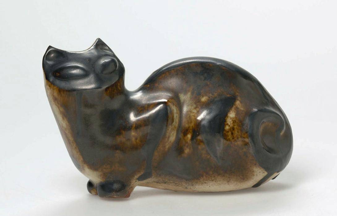 Artwork Siamese cat this artwork made of Terracotta, slip-cast with dark brown over cream glazes, created in 1960-01-01