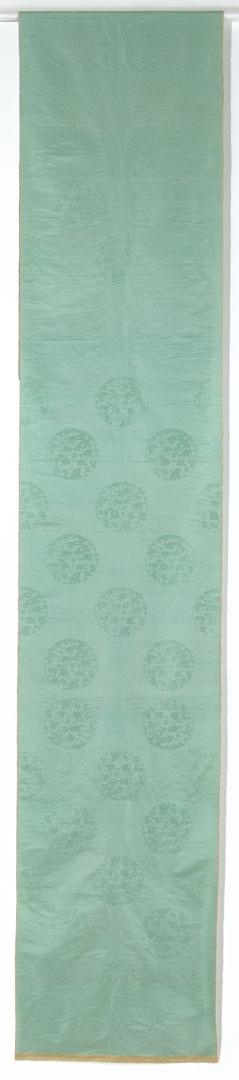 Artwork Textile length with roundels of foliage and butterflies this artwork made of Pale green silk damask weave, created in 1900-01-01