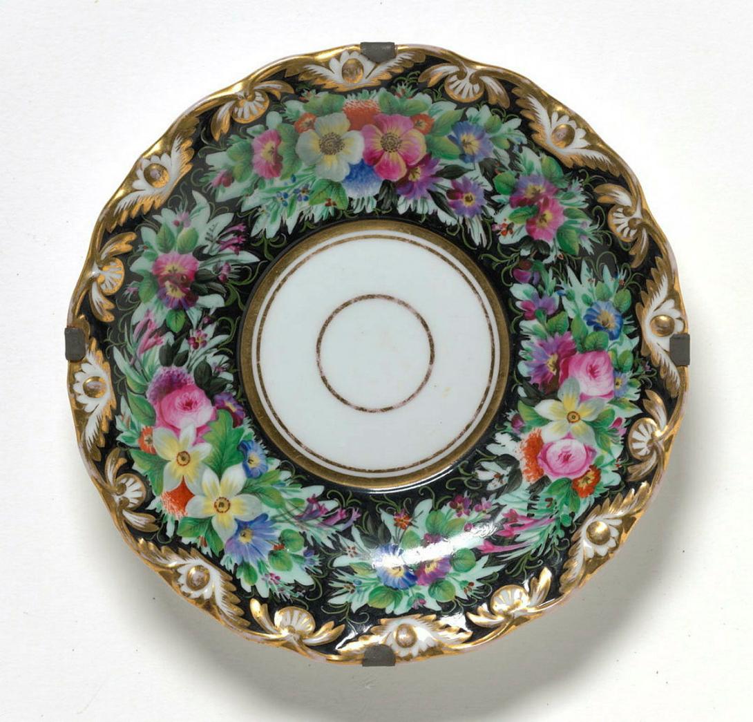 Artwork Saucer this artwork made of Hard-paste porcelain with design of rose in polychrome overglaze and gilt details