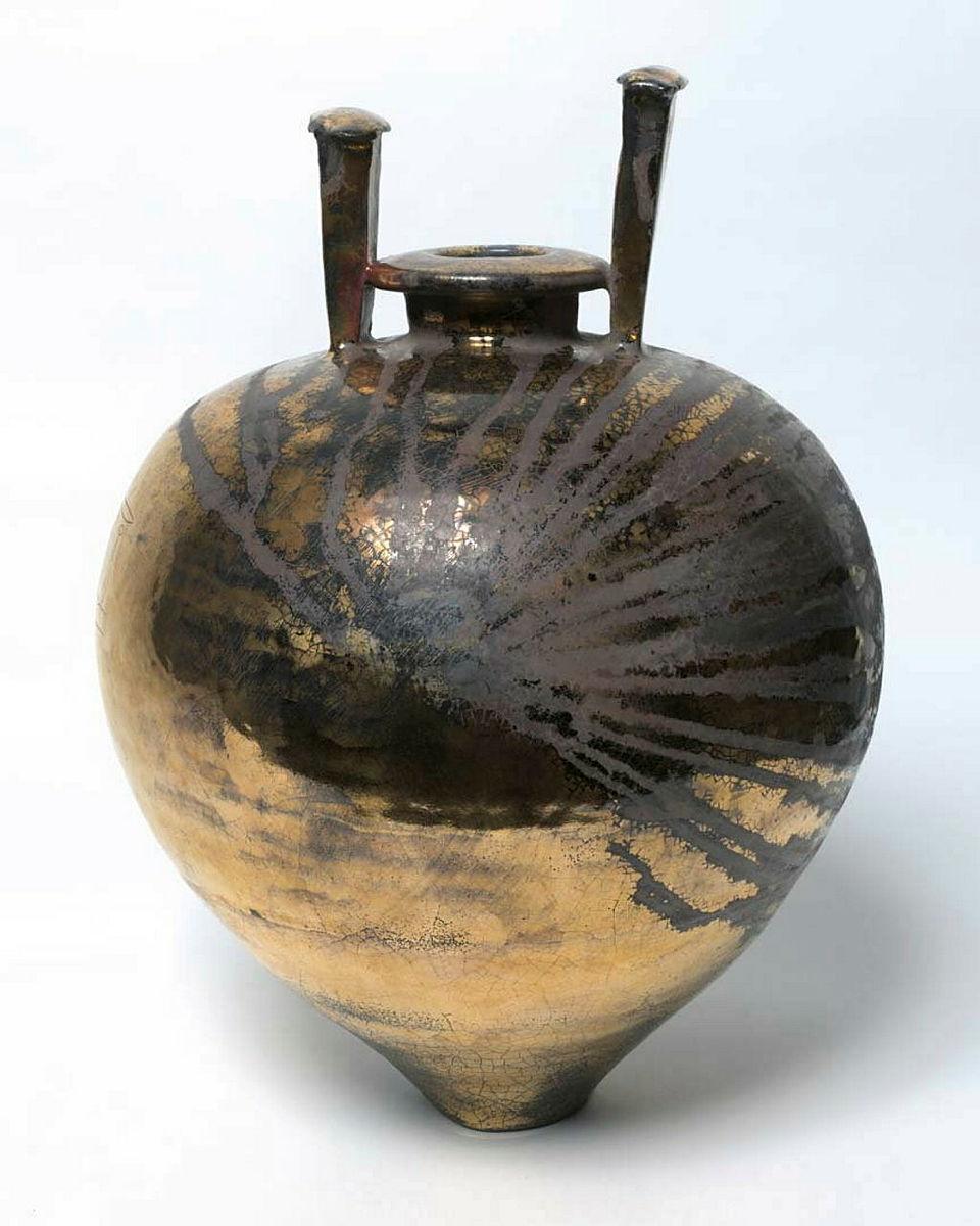 Artwork Vase:  Form 1 this artwork made of Stoneware, thrown with silver and gold lustres and incised decoration, created in 1980-01-01