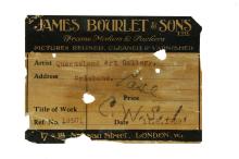 A detailed view of a label found on the back stretcher of Pablo Picasso's 'La Belle Hollandaise'.