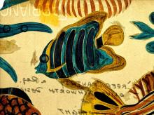 A detail shot of inscriptions and a water mark behind a fish a coral reef textile design by Olive Ashworth, only visible under transmitted light.