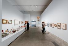 An installation view of a gallery space that brings together found objects on the theme of air.