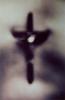 The seventh photograph in Michael Riley's 'Sacrifice (portfolio)' depicting a close up of a crucifix.