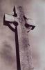 The nineth photograph in Michael Riley's 'Sacrifice (portfolio)' depicting a tombstone in the shape of a cross.