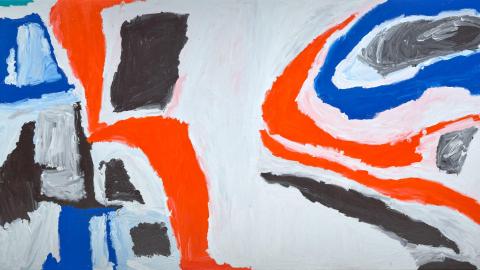 A detail view of an abstract painting made with bright red, blue and black paint against a white background.