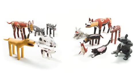 A photograph of QAGOMA's Collection of ku' (camp dog) sculptures
