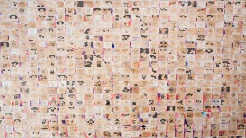 Installation view of a large work composed of hundreds of smaller works on paper