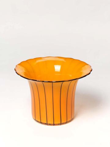 Artwork Vase this artwork made of Orange glass, cased clear glass with everted lip and overlaid with black lines and rim, created in 1910-01-01