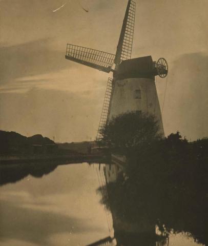 Artwork (Windmill by a stream) this artwork made of Gelatin silver photograph on paper, created in 1925-01-01