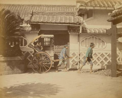 Artwork (Rickshaw drivers) (from 'Japan' album) this artwork made of Hand-coloured albumen photograph on board (originally bound in an album), created in 1870-01-01
