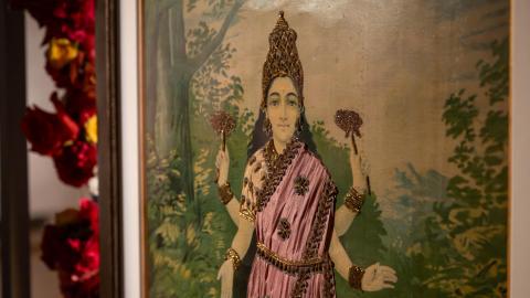 A detail view of an oleograph by Raja Ravi Varma, depicting the Hindu goddess Laxmi