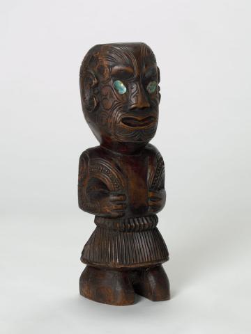 Artwork Figure (Maori) this artwork made of Wood, paua shells