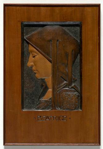 Artwork Plaque:  Beatrice this artwork made of Beech, inset, carved and stained, created in 1925-01-01