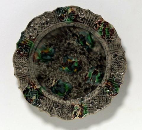Artwork Plate this artwork made of Earthenware, moulded silver shape border with mottled green, black and brown tortoise shell glaze, created in 1754-01-01
